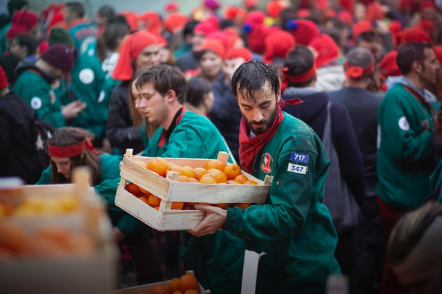 What is the Ivrea Carnival and Battle of the Oranges?